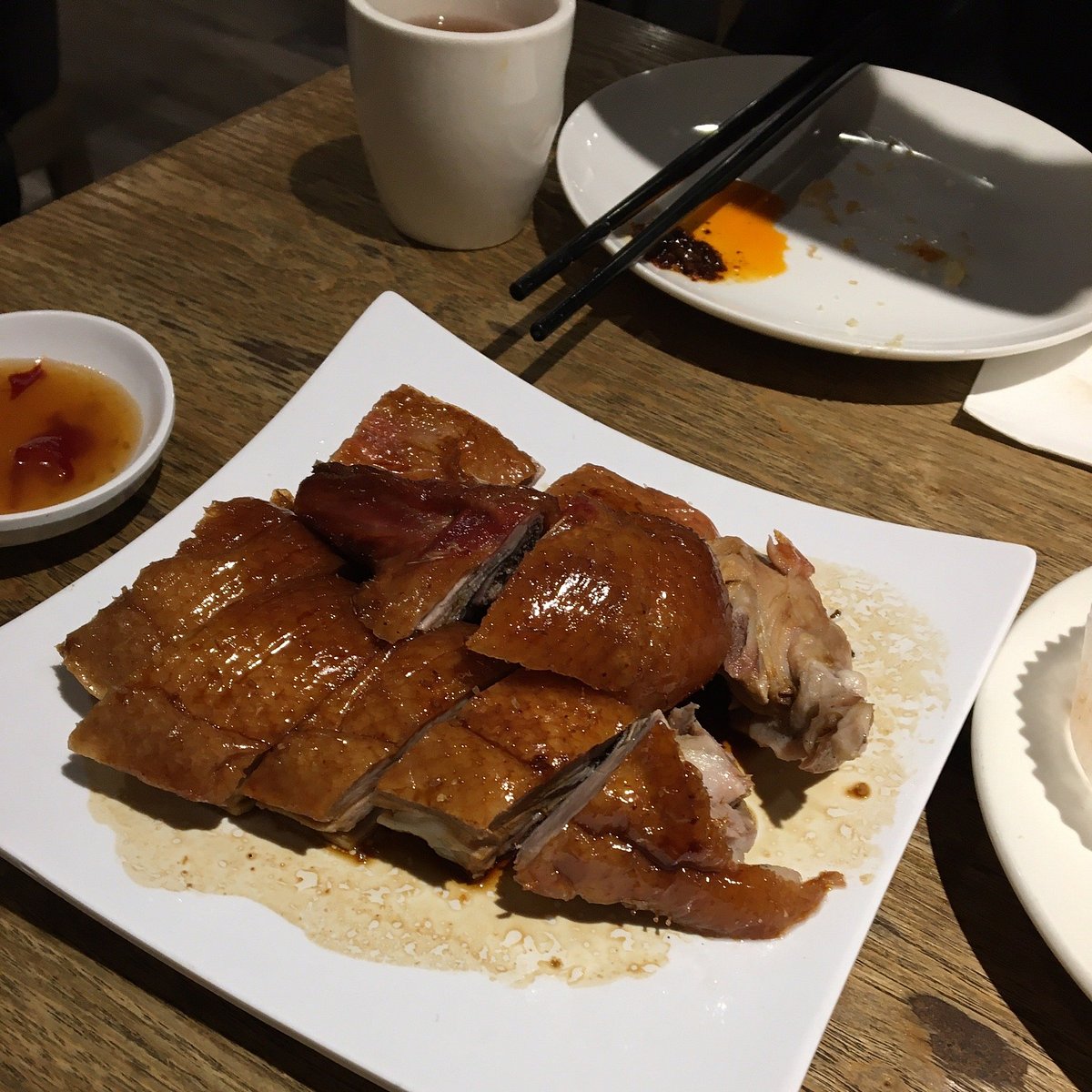 HK Bistro signature dishes BBQ Pork, Roast Duck, Wonton Noodle Soup, Baked Pork Chop with Rice, Hong Kong Style Milk Tea